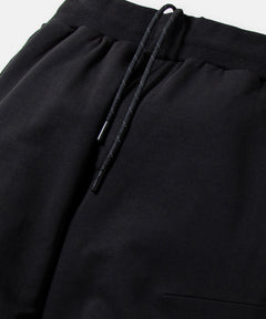  Encased elastic waistband with interior exit drawcord on Paper Planes Solid Jogger, color Black.